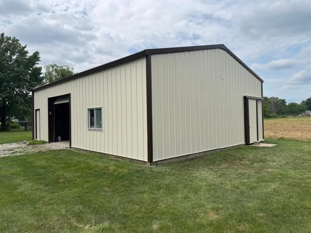 Exterior painting on a large metal building near Brownsburg, IN by Integrity in Blue
